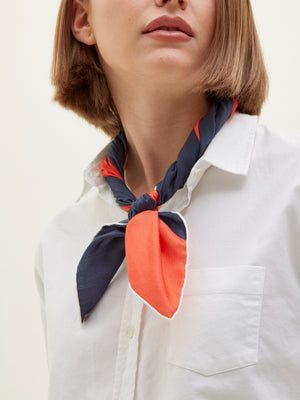 Les Belles Heures x Monocle 100% hand rolled cashmere, modal and silk scarf worn with a white oxford shirt